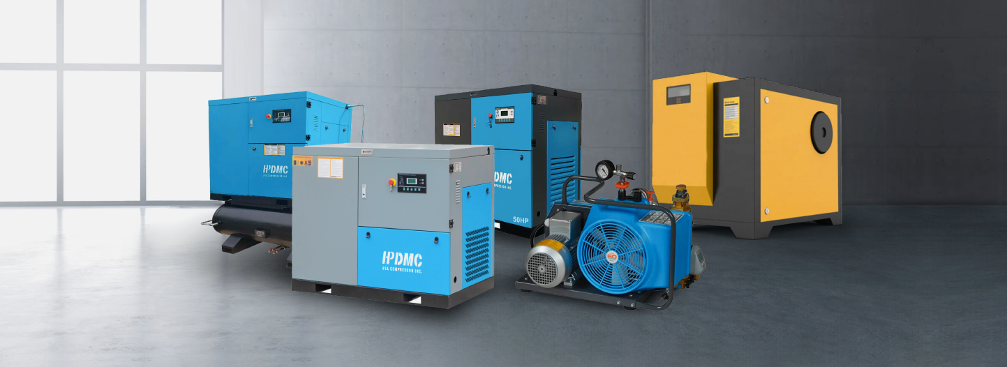 Industrial air compressors in blue, yellow, and gray arranged in a clean modern facility.